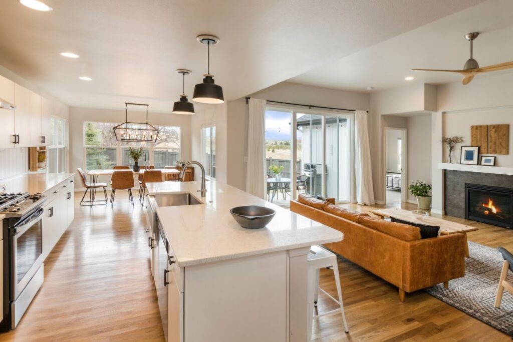 Open concept kitchen where the kitchen flows into the living and dining area